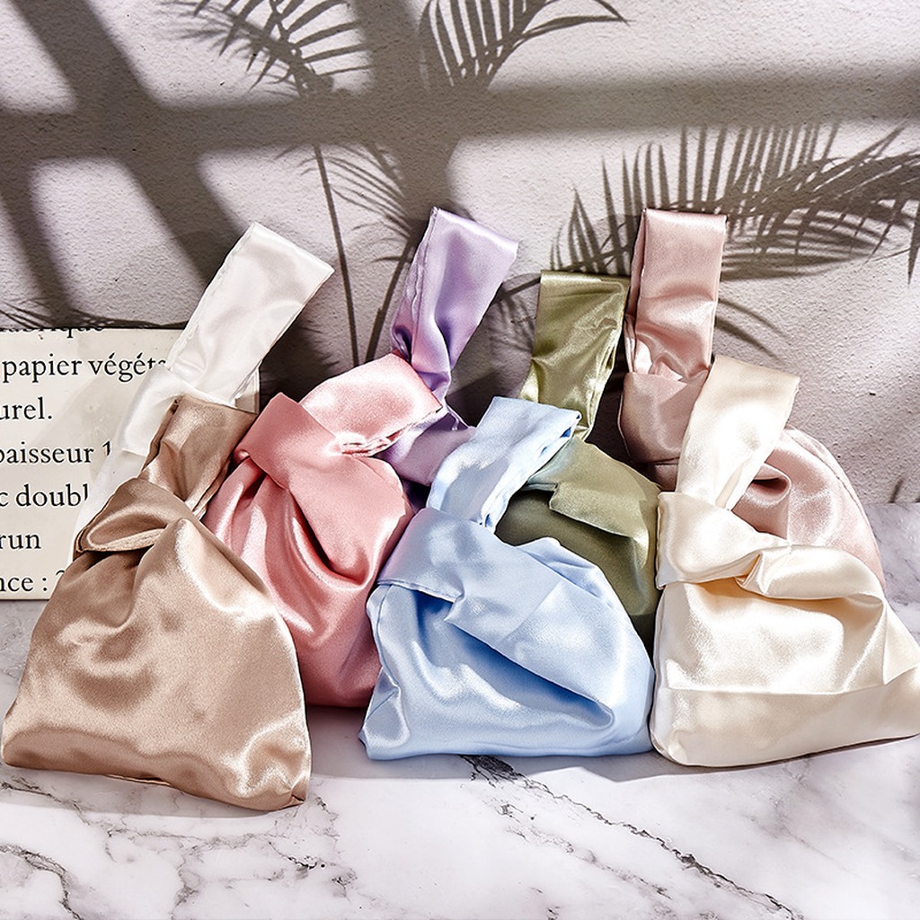 Damen Seiden-Satin Knoten-Hand – Luxury Bags Consignment Bewertung und Preis